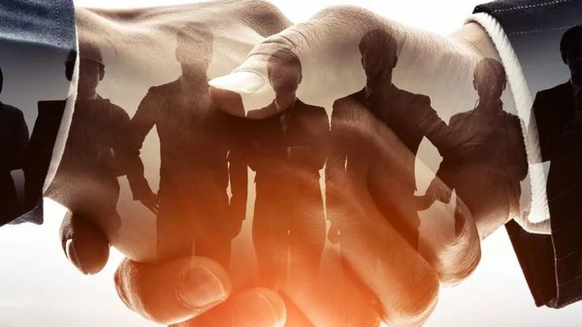 63de4616e35b-Deal-Uebernahme-Handshake-Verhandlung-169-Foto-iStock-metamorworks Deal Uebernahme Handshake Verhandlung 169 Foto iStock metamorworks
