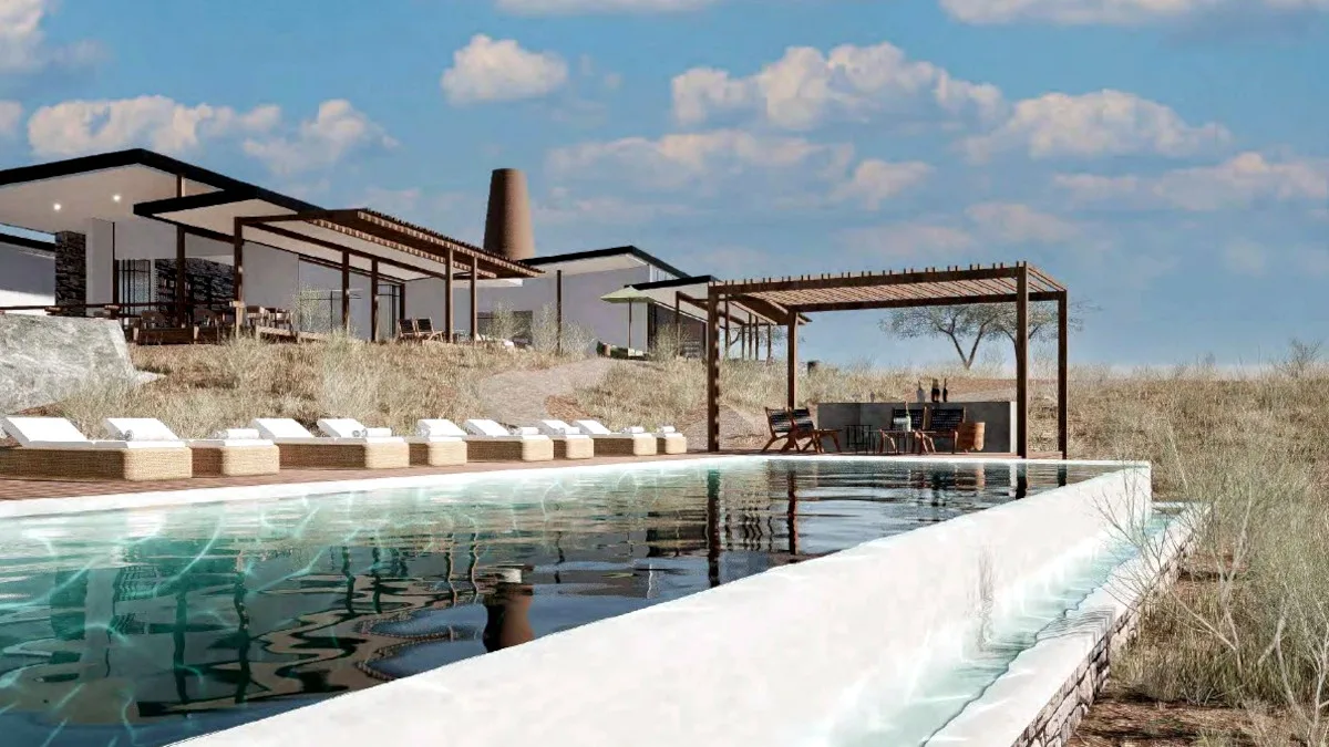 ef7b65f9b356-Chamaeleon-Moyoza-Lodge-Main-Building-from-Pool Chamäleon Moyoza Lodge Main Building from Pool.jpg