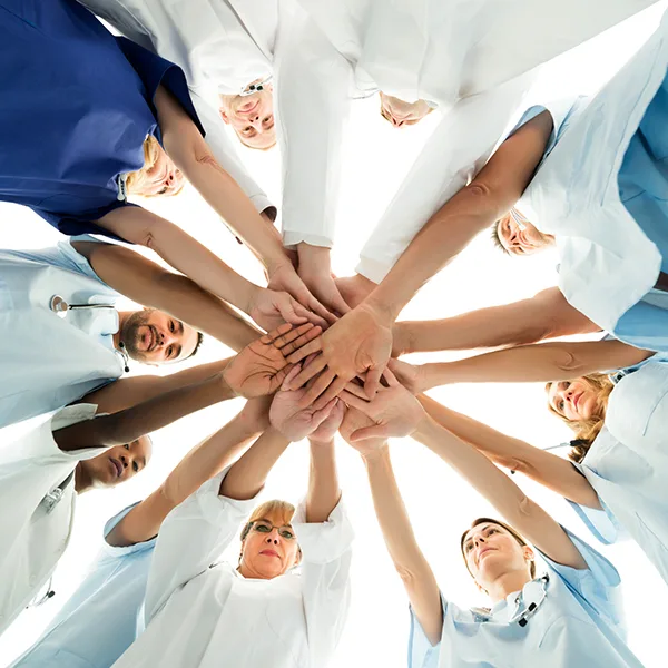f1653c0d52b4-Pflege-Team-Haende-von-unten-iStock-AndreyPopov Pflege Team Hände von unten iStock AndreyPopov.jpg