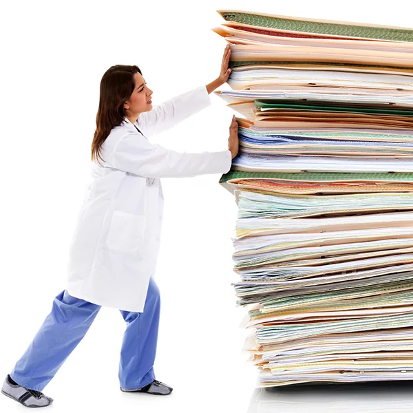 Bürokratie Gesundheitswesen Pflegerin Papierstapel iStock iodrakon.jpg